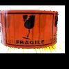 09e72b1fc300e518e6fdecabb3c258cdf3ed35e73c55ed389cafb6ef894218a0 Label - PVC-FRAGILE Black on Fluro Orange 75mmx100mmx50m 500/rl 24rl/ctn